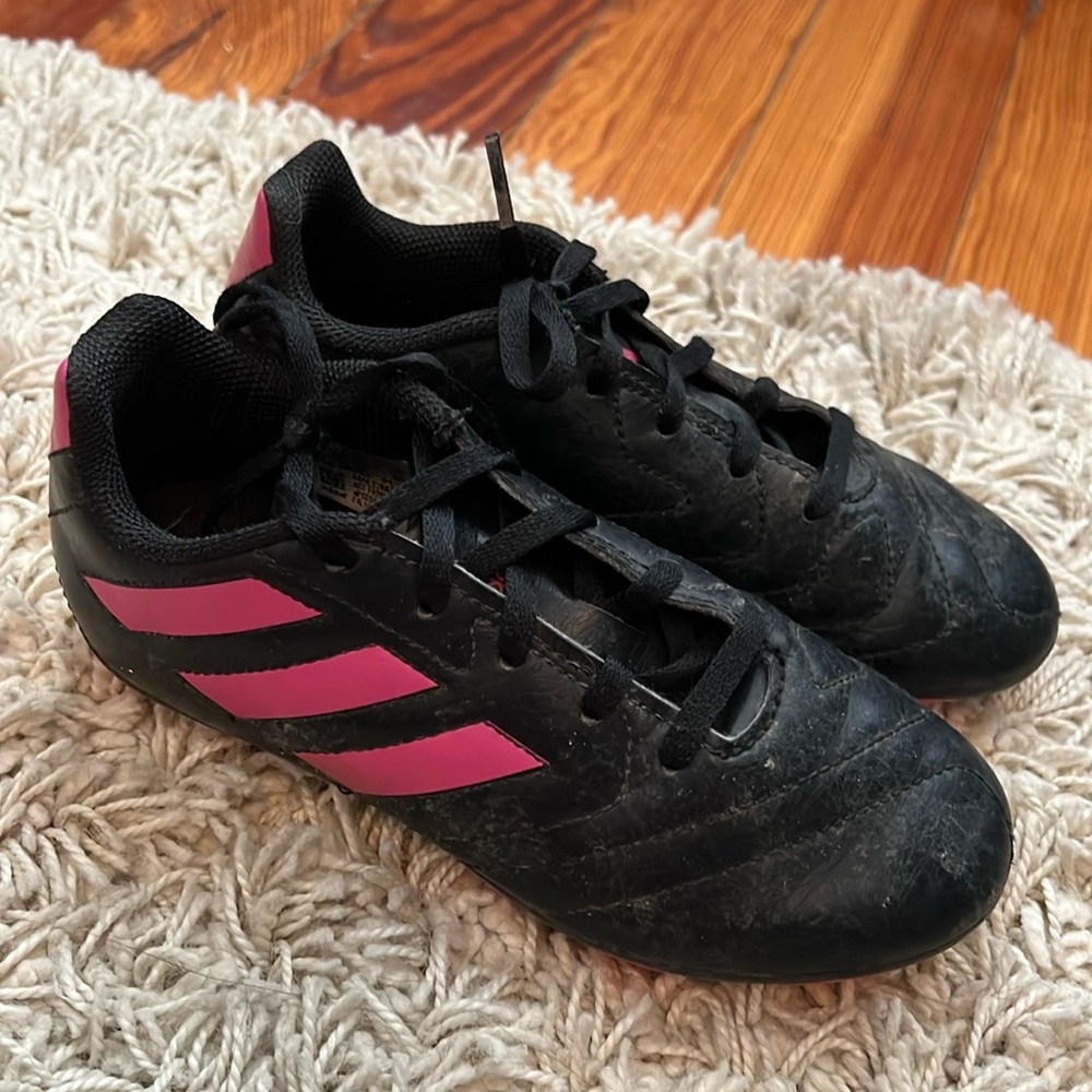 Adidas pink and black soccer cleats. Size 1